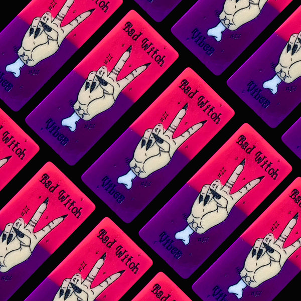 Pattern of hands making a peace sign with 'Bad Witch' halloween wax melts