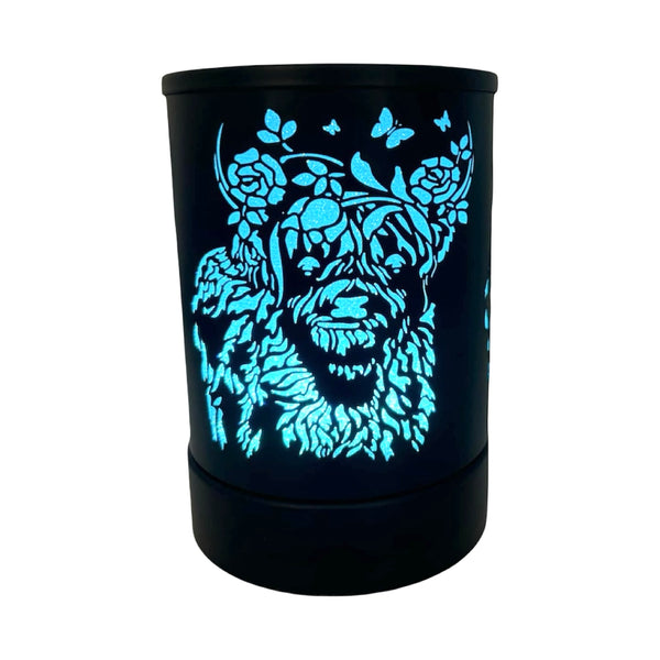 black electric wax melter with highland cow